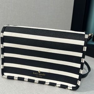 Kate Spade: white and black striped cross body bag